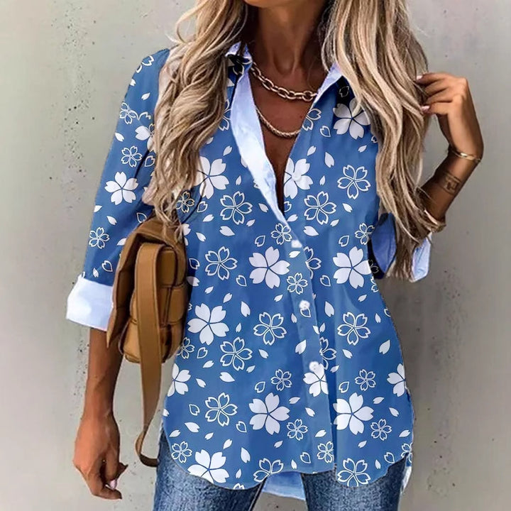 Damer blus med blommönster och färgövergång Mirla-Eva Jonsson