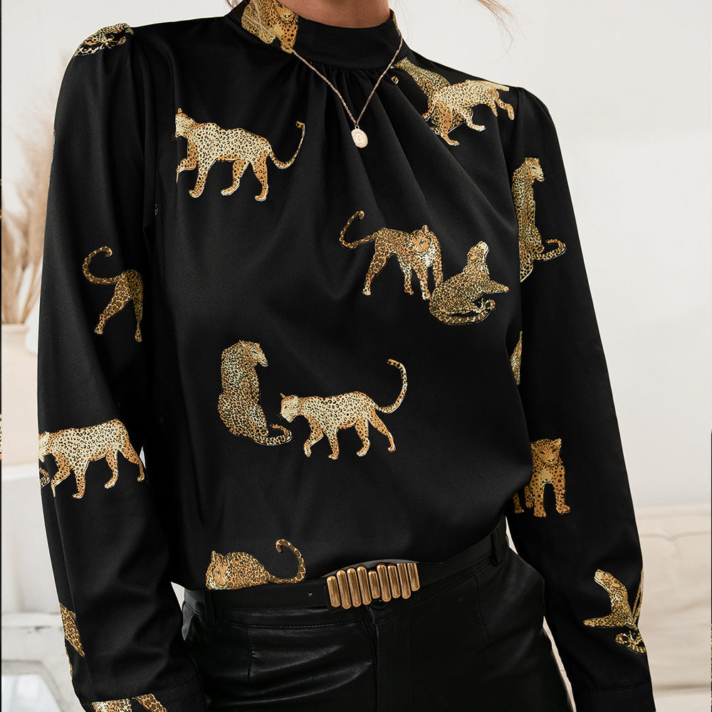 Damer blus med glamorös djurtryck och elegant ståkragsform Eva Jonsson-Eva Jonsson