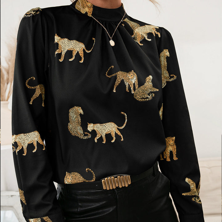Damer blus med glamorös djurtryck och elegant ståkragsform Eva Jonsson-Eva Jonsson
