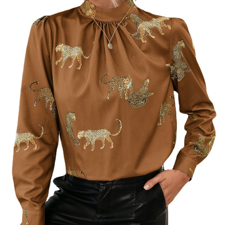 Damer blus med glamorös djurtryck och elegant ståkragsform Eva Jonsson-Eva Jonsson
