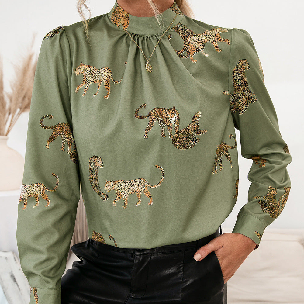 Damer blus med glamorös djurtryck och elegant ståkragsform Eva Jonsson-Eva Jonsson