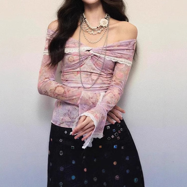 Damer blus med off-shoulder design och blommiga mönster Mirla-Eva Jonsson