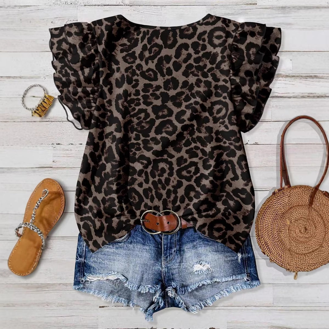 Damer blus med puffärm och blommönster Mirla-Eva Jonsson