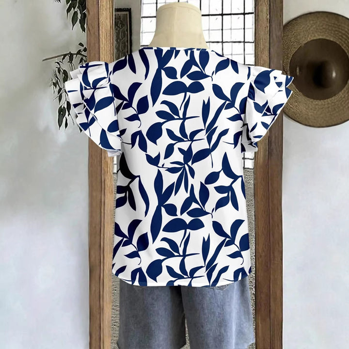 Damer blus med puffärm och blommönster Mirla-Eva Jonsson