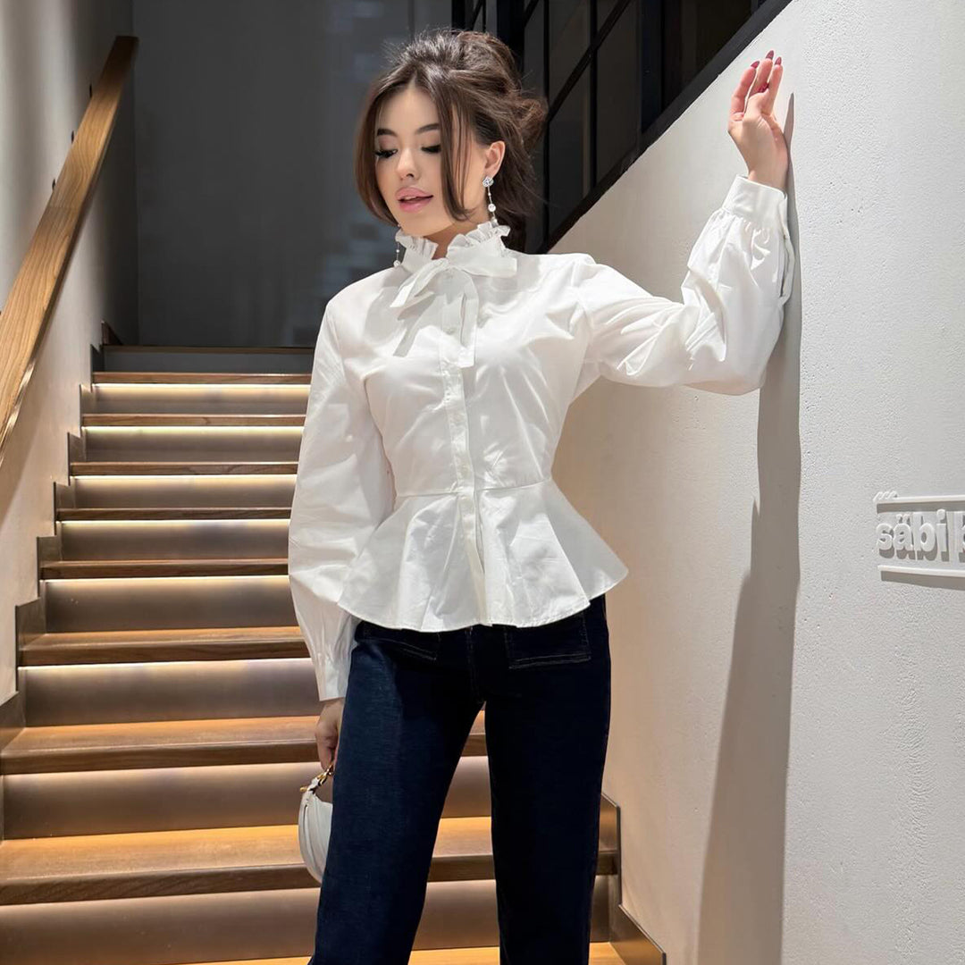Damer blus med volangdetalj och smickrande snitt-Eva Jonsson