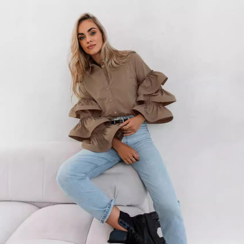 Damer blus med voluminösa volangärmar Mirla-Eva Jonsson