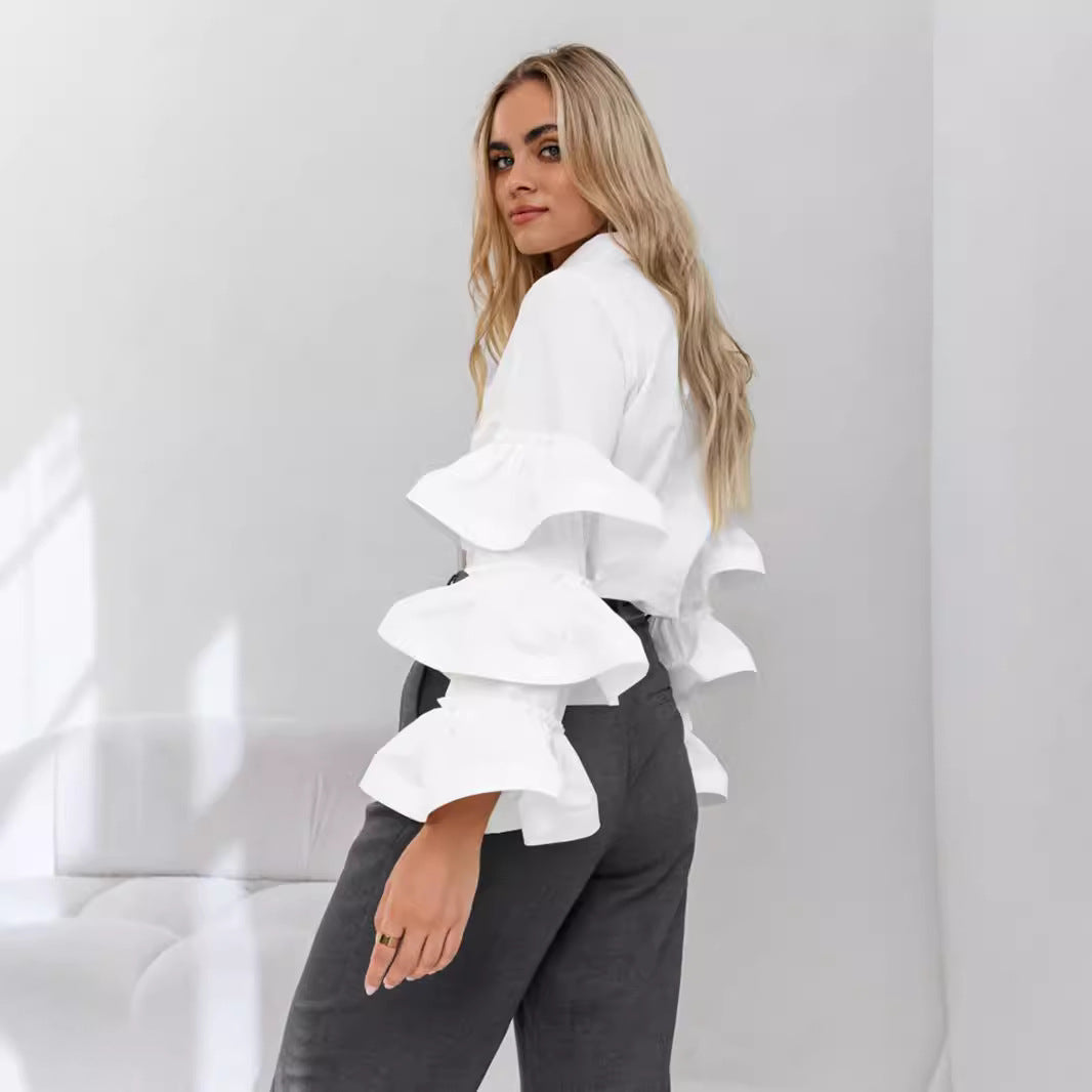 Damer blus med voluminösa volangärmar Mirla-Eva Jonsson