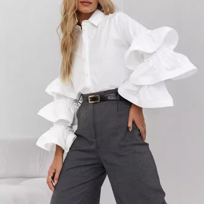 Damer blus med voluminösa volangärmar Mirla-Eva Jonsson