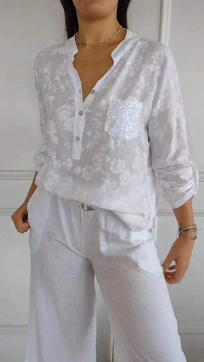 Damer blus skjorta med blommigt mönster och glittrande detalj Mirla-Eva Jonsson