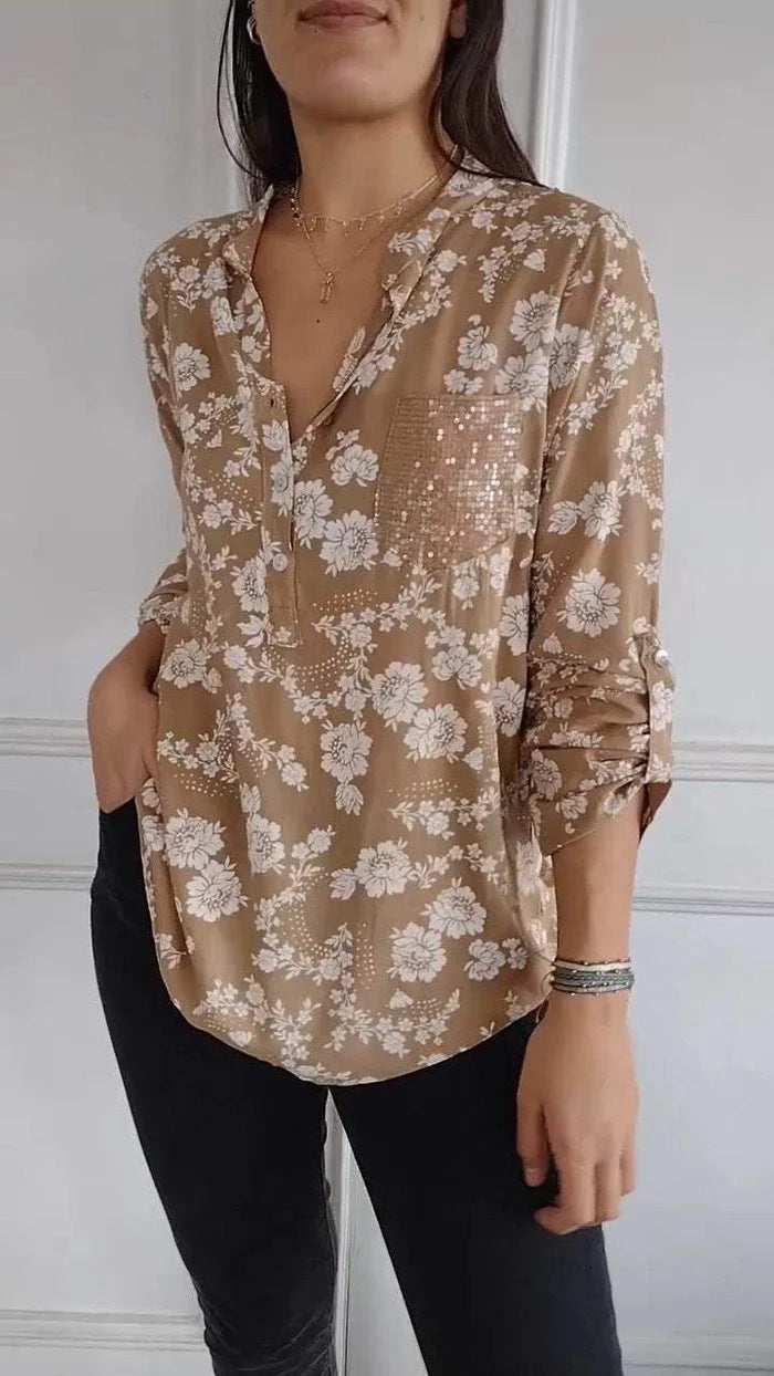 Damer blus skjorta med blommigt mönster och glittrande detalj Mirla-Eva Jonsson