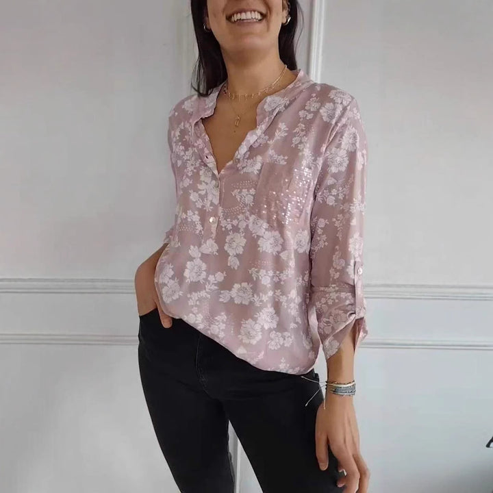 Damer blus skjorta med blommigt mönster och glittrande detalj Mirla-Eva Jonsson