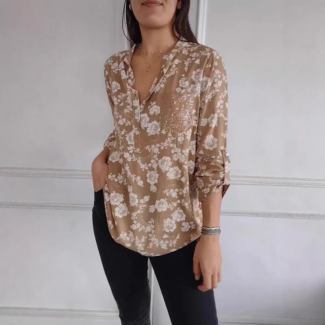 Damer blus skjorta med blommigt mönster och glittrande detalj Mirla-Eva Jonsson