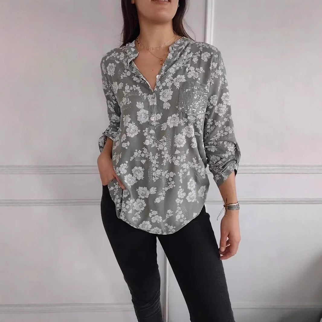 Damer blus skjorta med blommigt mönster och glittrande detalj Mirla-Eva Jonsson