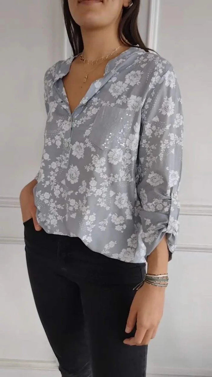 Damer blus skjorta med blommigt mönster och glittrande detalj Mirla-Eva Jonsson