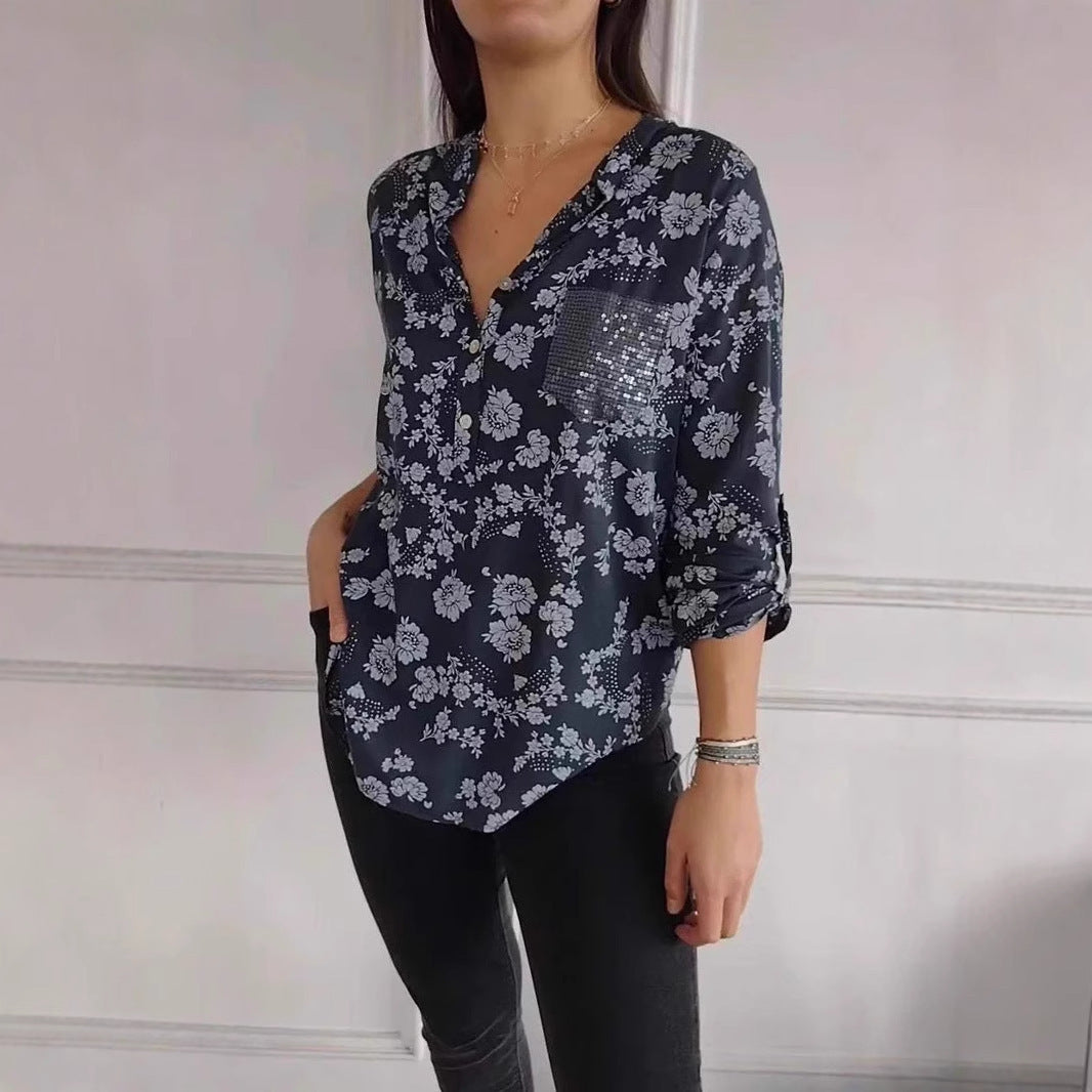 Damer blus skjorta med blommigt mönster och glittrande detalj Mirla-Eva Jonsson