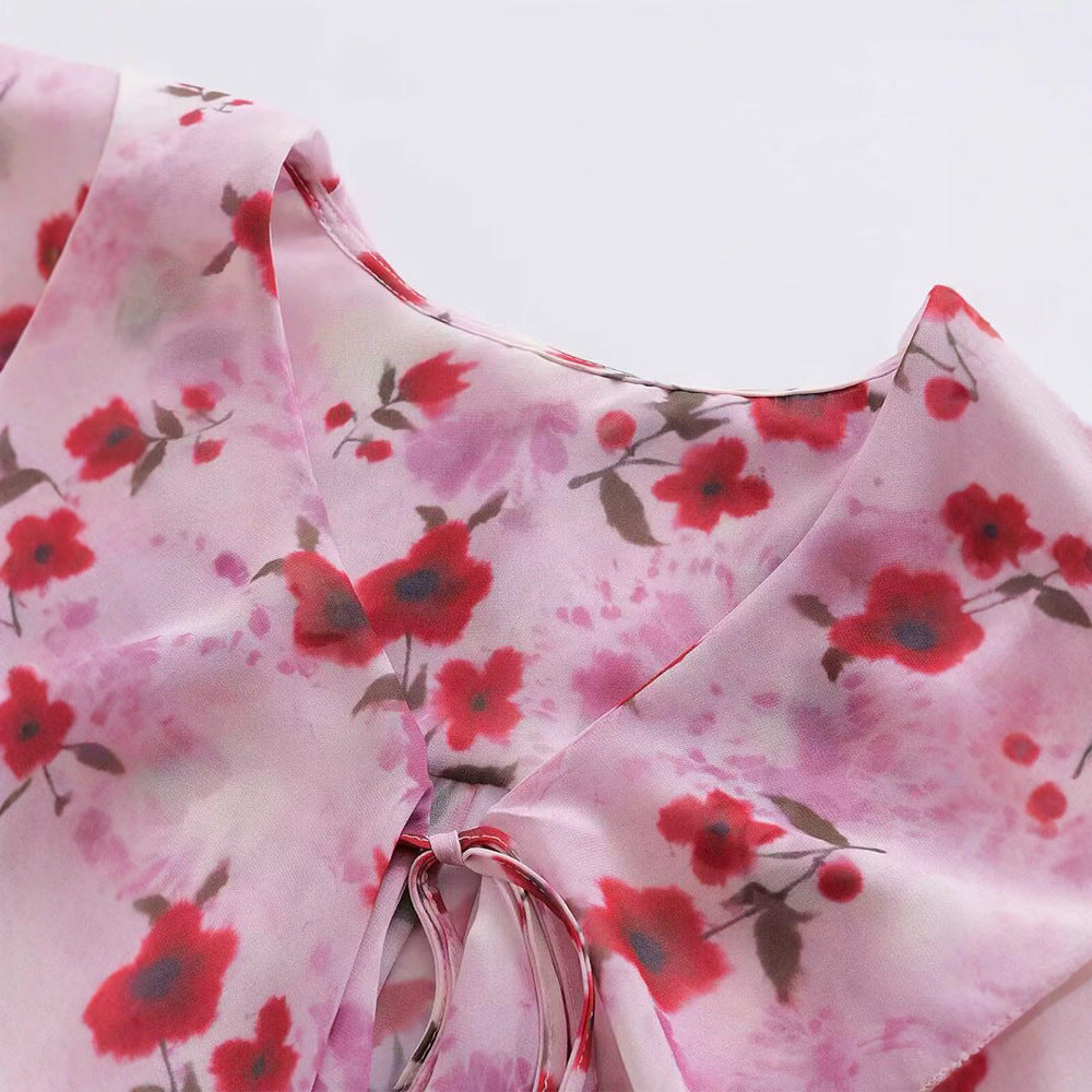 Damer blusblus med volangdesign och blommönster Mirla-Eva Jonsson