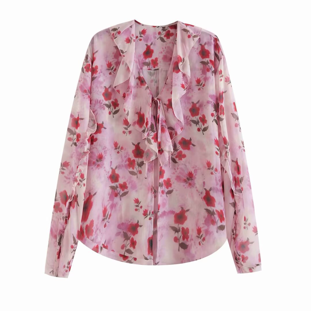 Damer blusblus med volangdesign och blommönster Mirla-Eva Jonsson