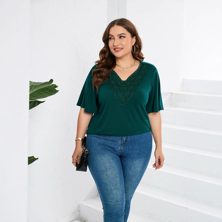 Damer blusenshirt med elegant hålbroderi och vida ärmar Mirla-Eva Jonsson