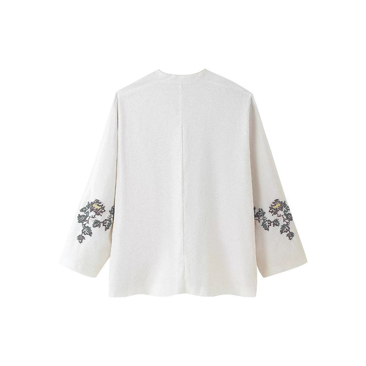 Damer blusenshirt med florala broderade detaljer och knytband Mirla-Eva Jonsson