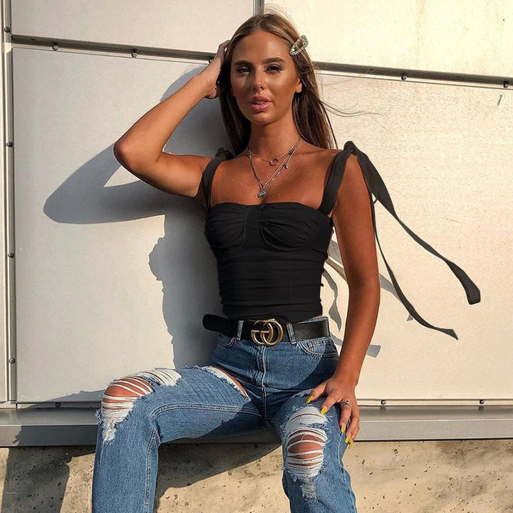 Damer blusöverdel med raffinerade axelremmar och elegant drapering Mirla-Eva Jonsson