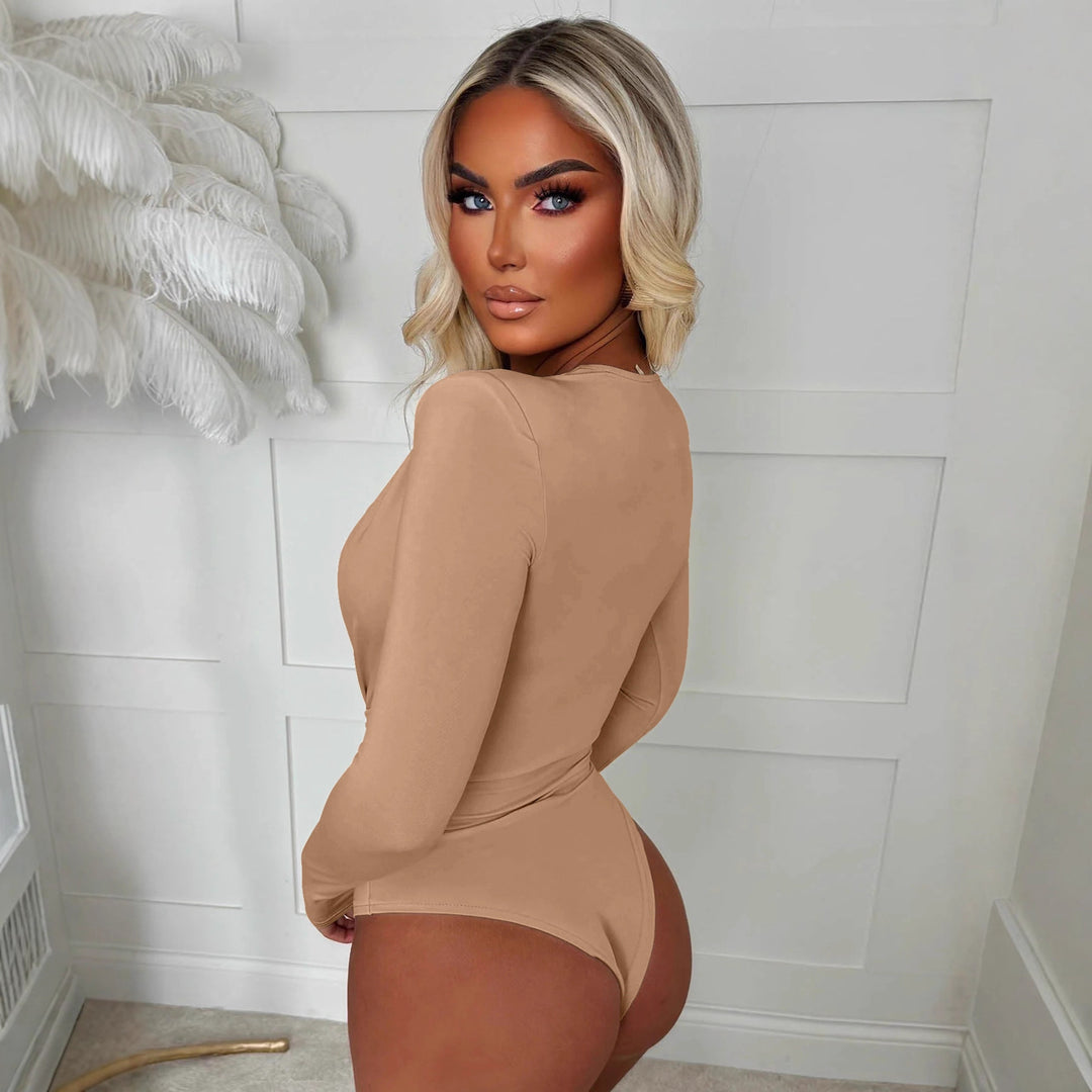 Damer body med djup V-ringning och smal bälte Mirla-Eva Jonsson