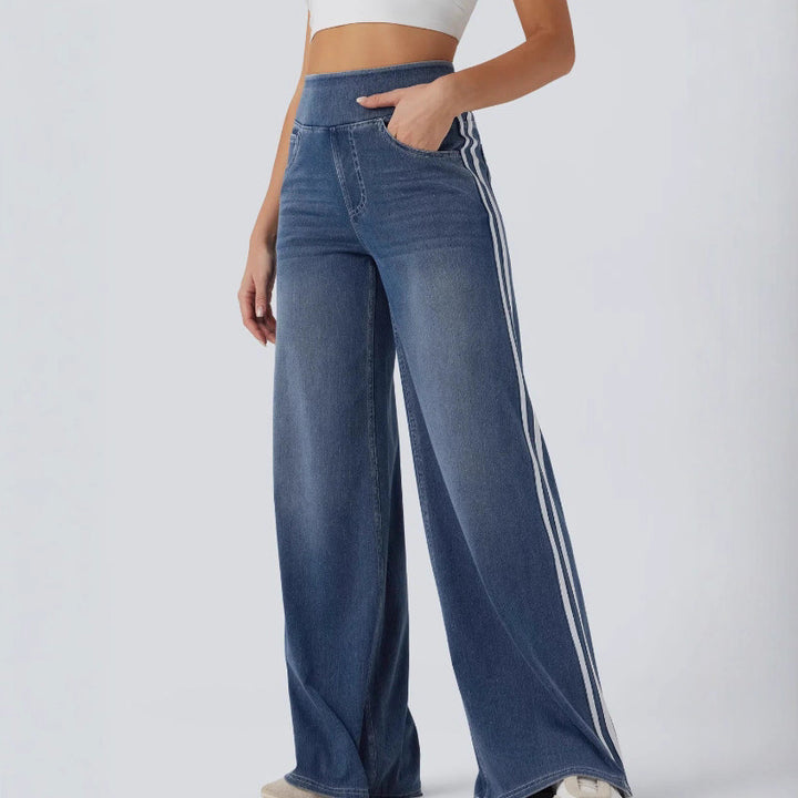 Damer breda denimbyxor med sidostrand och hög midja Mirla-Eva Jonsson