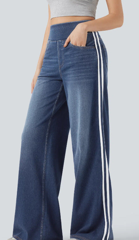 Damer breda denimbyxor med sidostrand och hög midja Mirla-Eva Jonsson