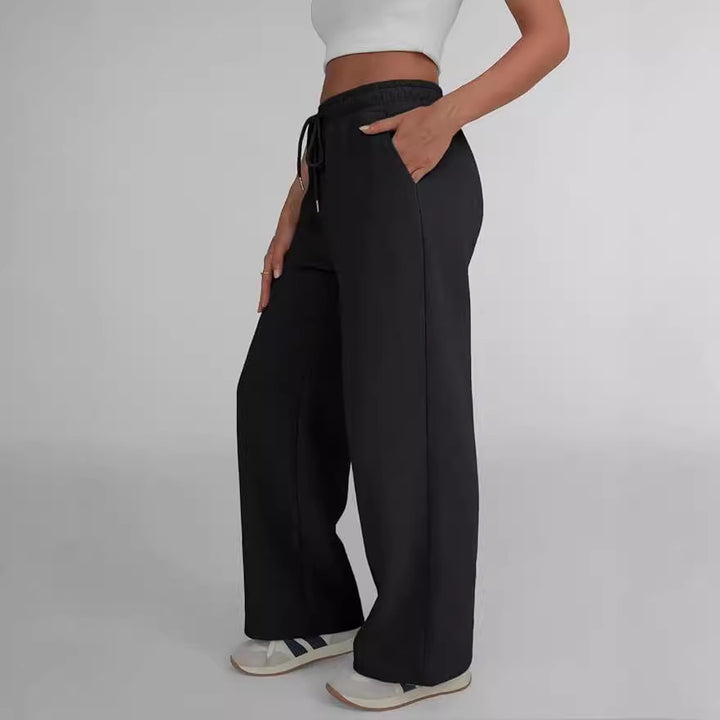 Damer breda fritids-joggingbyxor med elastisk midja Mirla-Eva Jonsson