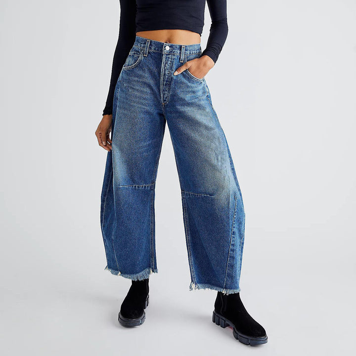 Damer breda jeans i avslappnad skärning med fransade nederkanter och hög midja Eva Jonsson-Eva Jonsson