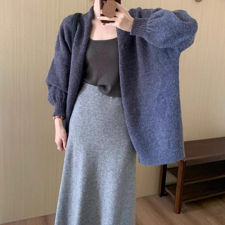 Damer cardigan i fin stickad material med avslappnad passform och långa ärmar Mirla-Eva Jonsson