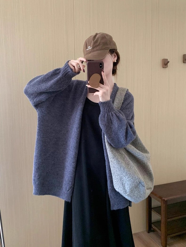 Damer cardigan i fin stickad material med avslappnad passform och långa ärmar Mirla-Eva Jonsson
