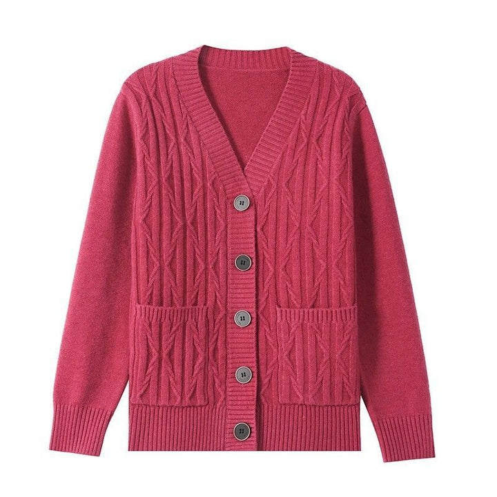 Damer cardigan med fint kabelmönster och praktiska fickor Mirla-Eva Jonsson