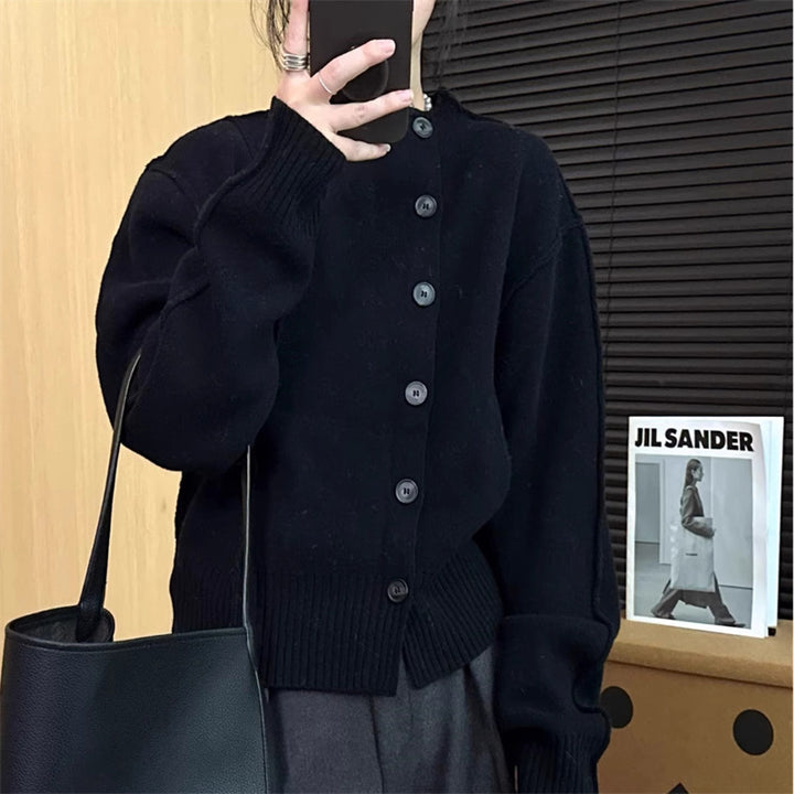 Damer cardigan med knäppning och ribbade detaljer Mirla-Eva Jonsson