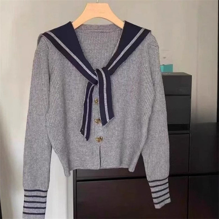 Damer cardigan med maritim krage och knappdetaljer Mirla-Eva Jonsson