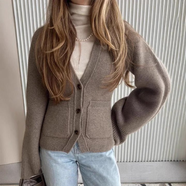 Damer cardigan med voluminösa ärmar och praktiska fickor Mirla-Eva Jonsson