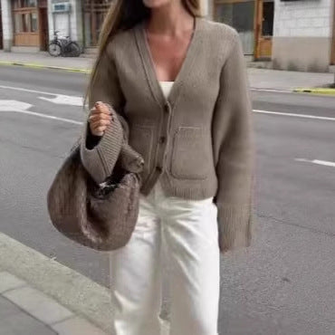 Damer cardigan med voluminösa ärmar och praktiska fickor Mirla-Eva Jonsson