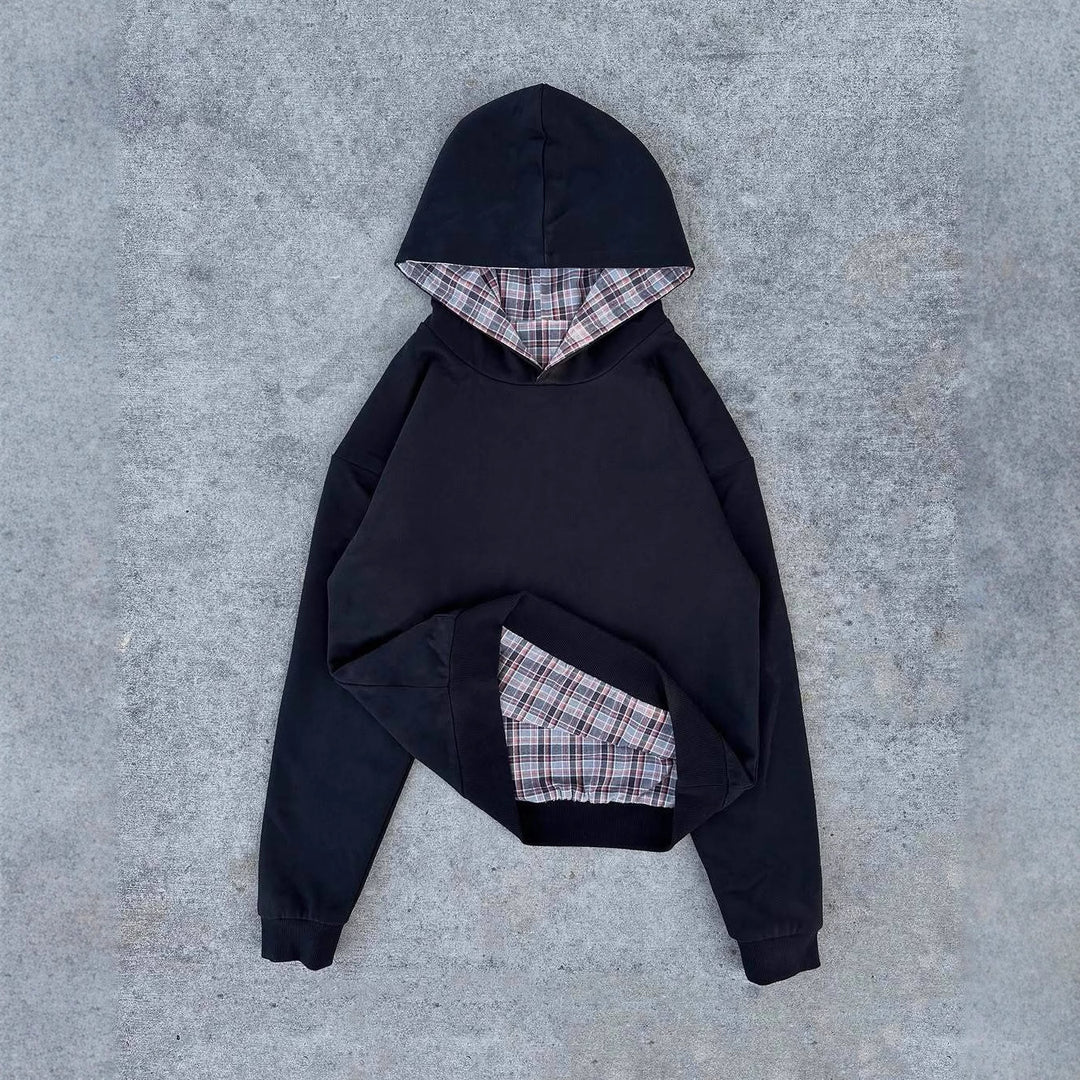 Damer casual hoodie med vadderad innerfoder och kontrasterande rutmönster Mirla-Eva Jonsson