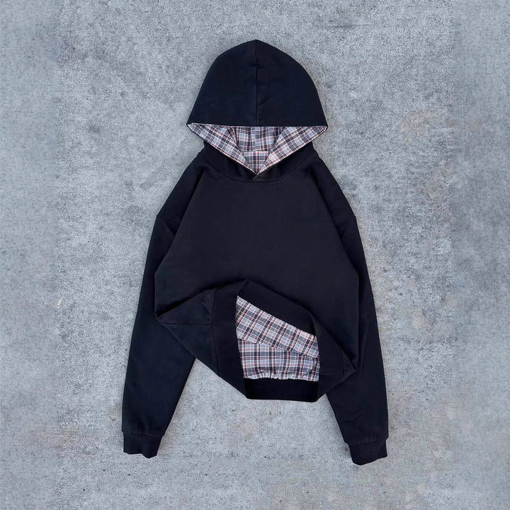 Damer casual hoodie med vadderad innerfoder och kontrasterande rutmönster Mirla-Eva Jonsson