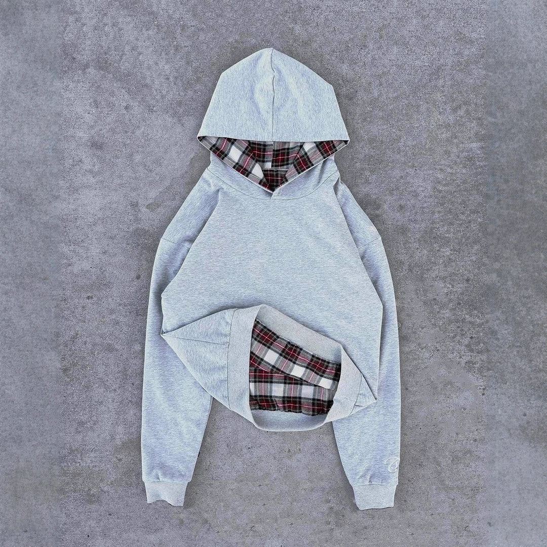 Damer casual hoodie med vadderad innerfoder och kontrasterande rutmönster Mirla-Eva Jonsson