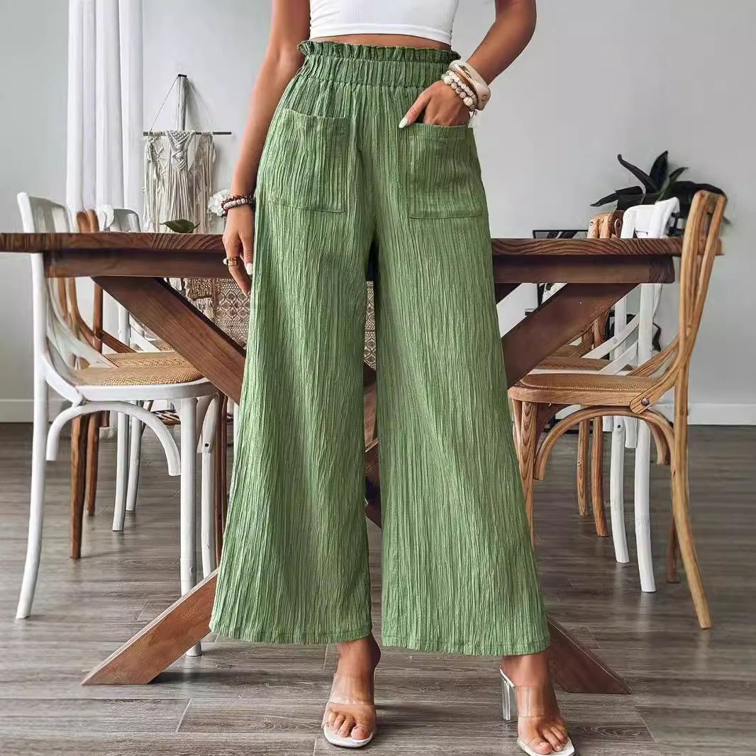 Damer casual och lätta Palazzo-byxor med elastisk midja och praktiska fickor Mirla-Eva Jonsson