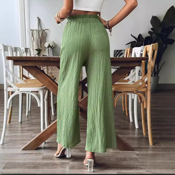 Damer casual och lätta Palazzo-byxor med elastisk midja och praktiska fickor Mirla-Eva Jonsson