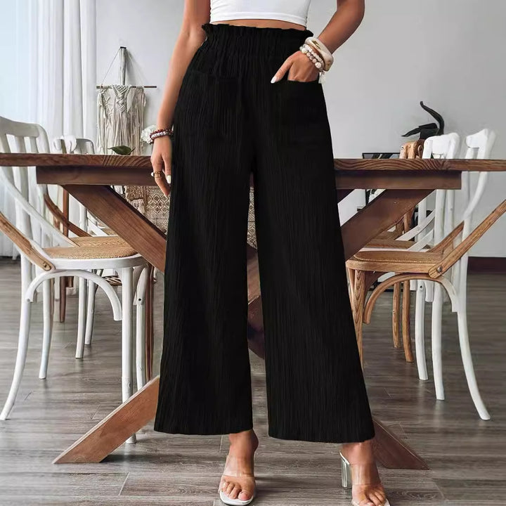 Damer casual och lätta Palazzo-byxor med elastisk midja och praktiska fickor Mirla-Eva Jonsson