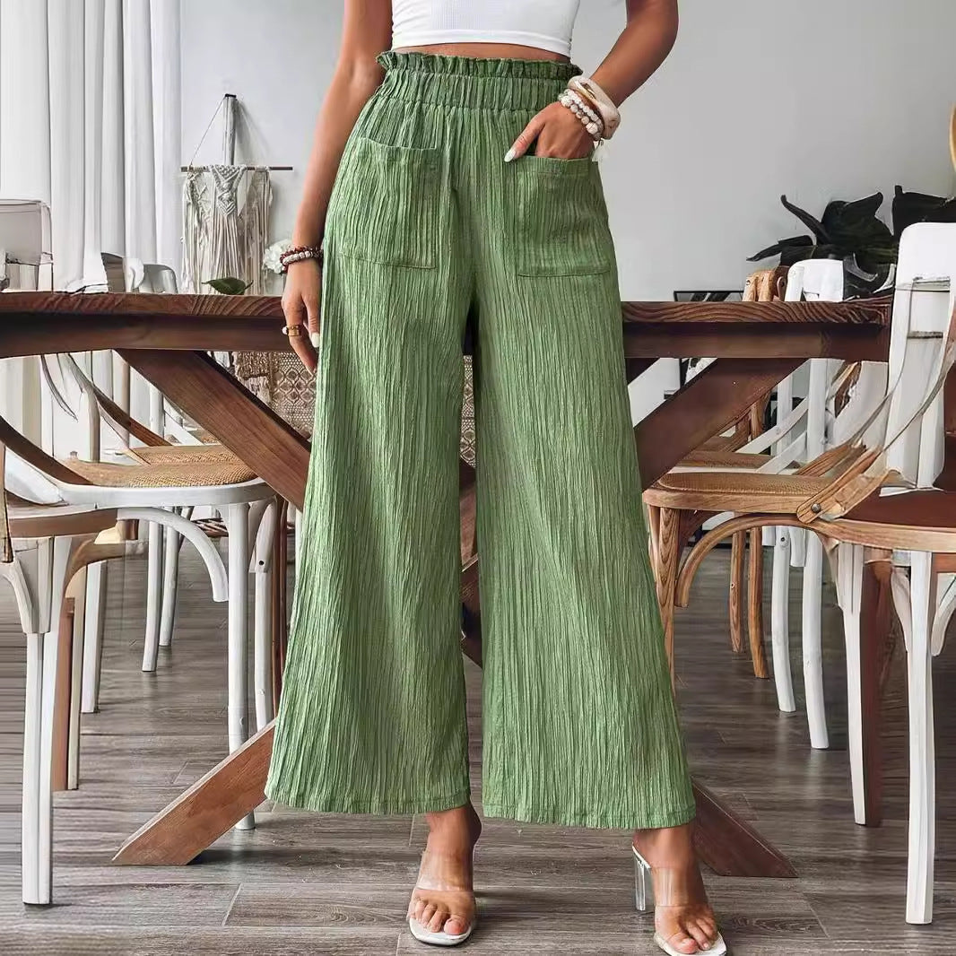 Damer casual och lätta Palazzo-byxor med elastisk midja och praktiska fickor Mirla-Eva Jonsson