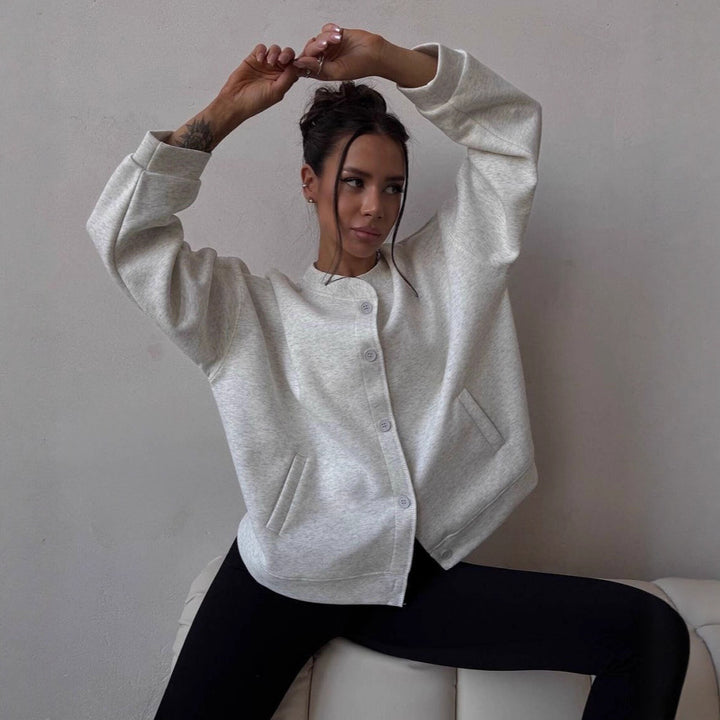 Damer casual oversized sweatshirtjacka med praktiska fickor och knapprad Mirla-Eva Jonsson