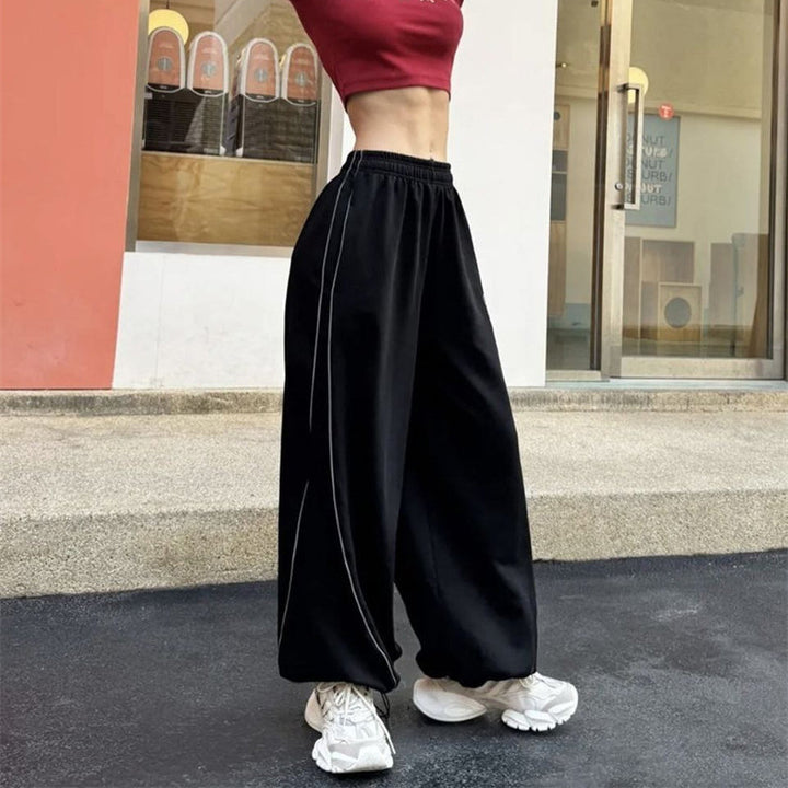 Damer casual sportbyxor med sidostråk och praktiska fickor Mirla-Eva Jonsson