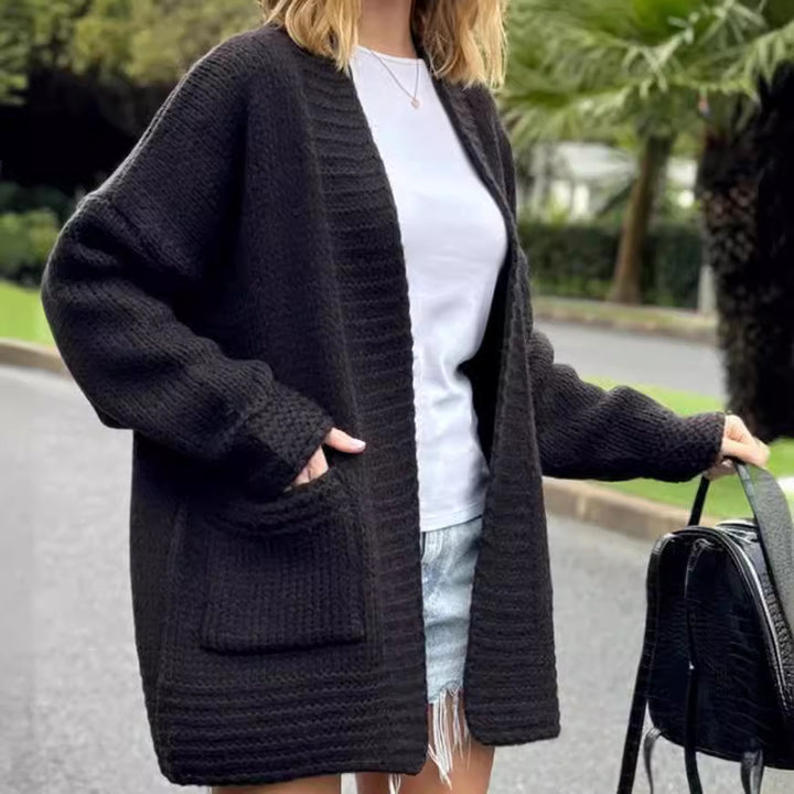 Damer casual stickad cardigan med praktiska fickor och öppen design Mirla-Eva Jonsson