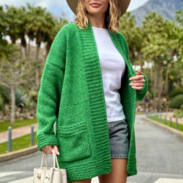 Damer casual stickad cardigan med praktiska fickor och öppen design Mirla-Eva Jonsson