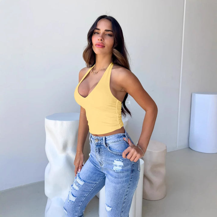 Damer crop-top med djup V-hals och modernt halterdesign Mirla-Eva Jonsson