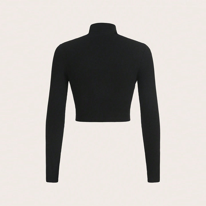 Damer crop top med hög halsdesign och sofistikerad utskärning Mirla-Eva Jonsson