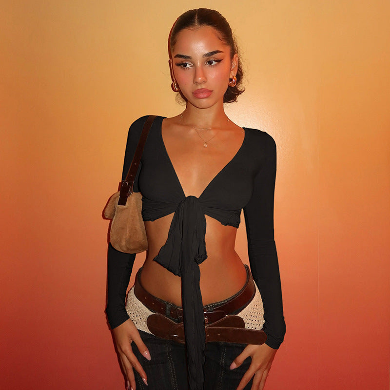 Damer crop top med lekfullt band och långa ärmar Mirla-Eva Jonsson